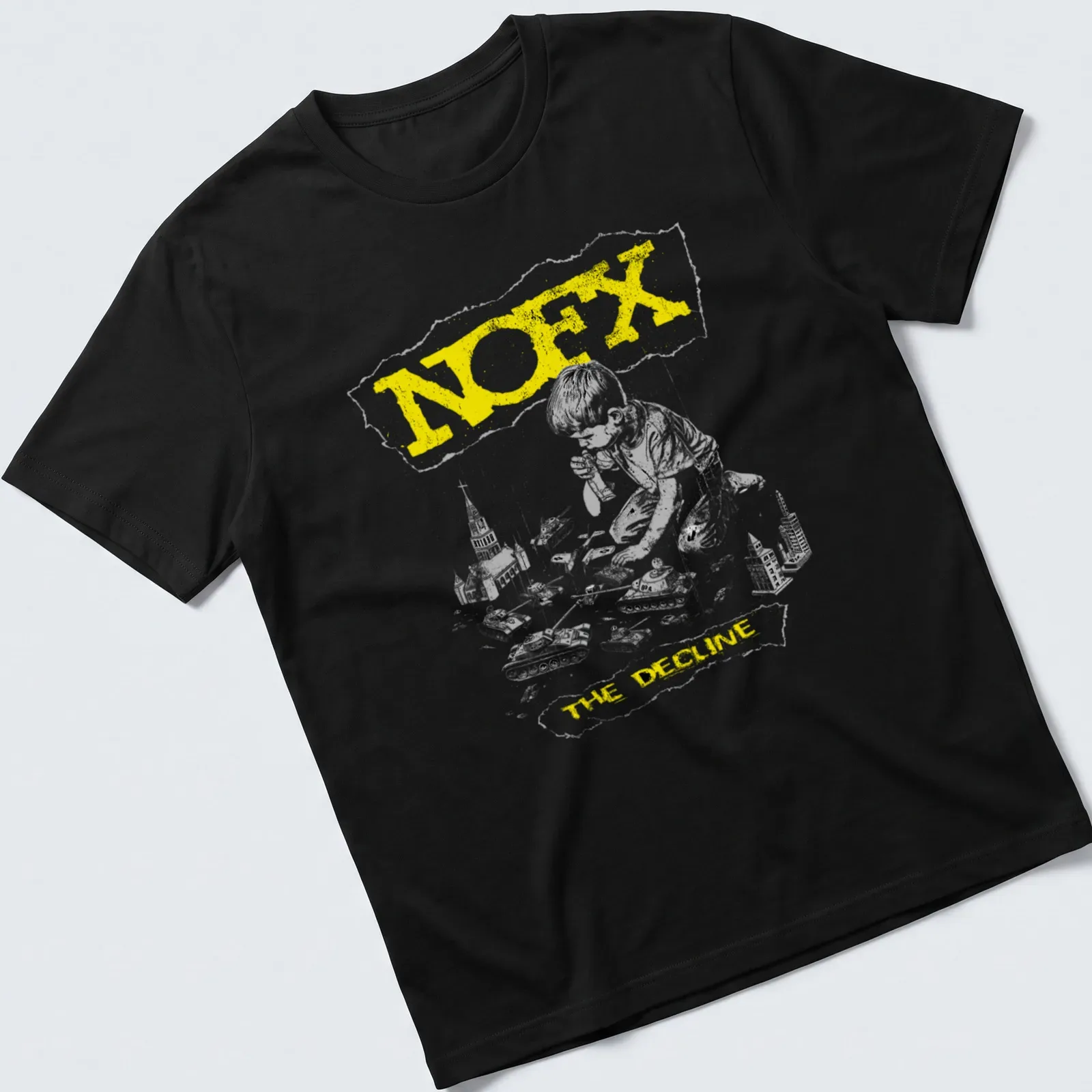 Grunge-style t-shirt with a boy playing with toy tanks and NOFX text — printed on a unisex t-shirt