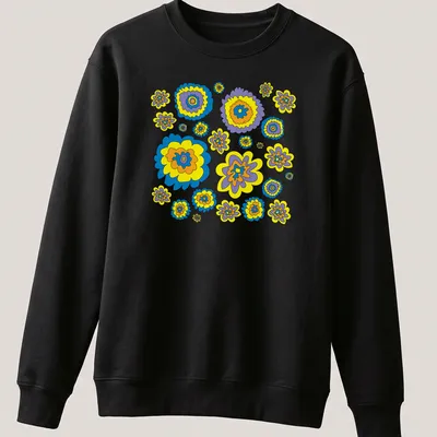 Graphic t-shirt featuring colorful flowers in blue, yellow, purple, and orange — printed on a unisex sweatshirt