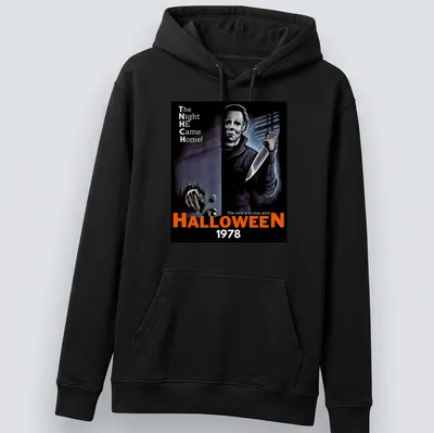 Retro horror t-shirt featuring Michael Myers and Halloween 1978 text in black, orange, white, and gray. — printed on a unisex hoodie