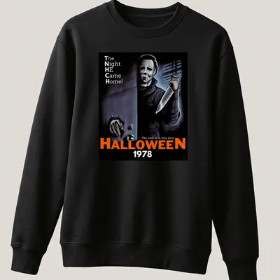 Retro horror t-shirt featuring Michael Myers and Halloween 1978 text in black, orange, white, and gray. — printed on a unisex sweatshirt