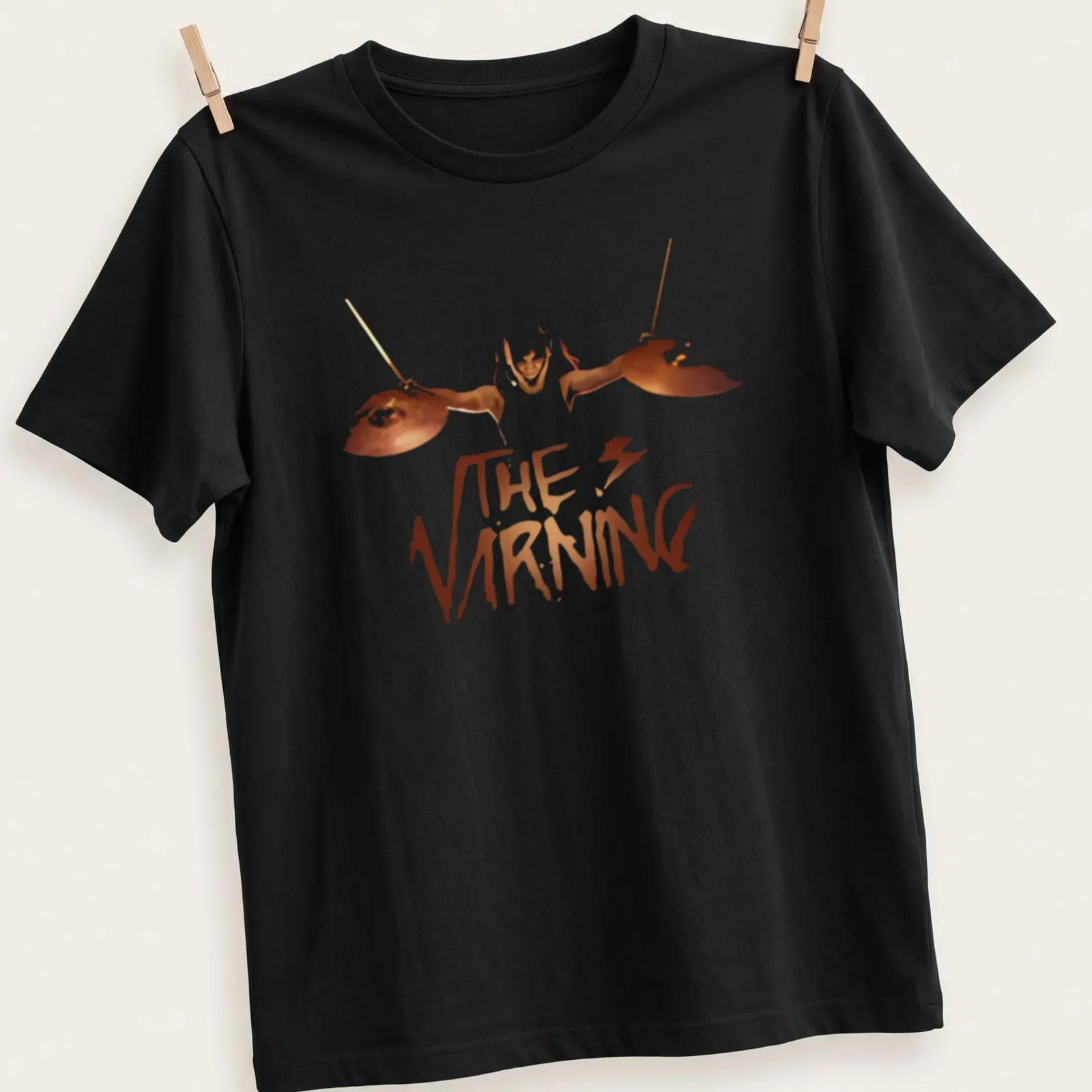 Bold graphic t-shirt featuring a drummer silhouette and 'THE VIRNING' text — printed on a unisex t-shirt
