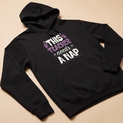 Boldly printed humorous T-shirt for teachers with nap-themed message in purple and cream — printed on a unisex hoodie
