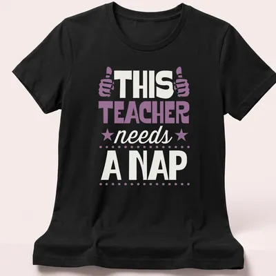 Boldly printed humorous T-shirt for teachers with nap-themed message in purple and cream — printed on a women's shirt