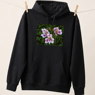 Realistic floral design featuring pink, white, green, and yellow flowers with the text 'Three Beauties' — printed on a unisex hoodie