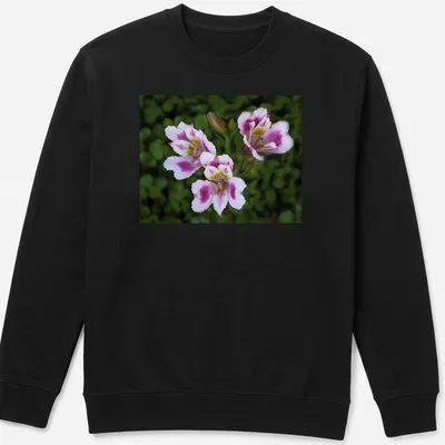 Realistic floral design featuring pink, white, green, and yellow flowers with the text 'Three Beauties' — printed on a unisex sweatshirt