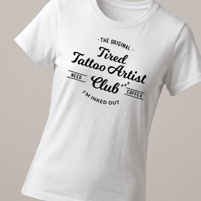 Vintage script t-shirt with tattoo artist humor about needing coffee — printed on a women's shirt