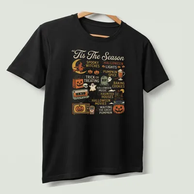 Retro Halloween-themed t-shirt with pumpkin and festive icons — printed on a unisex t-shirt (angled view)
