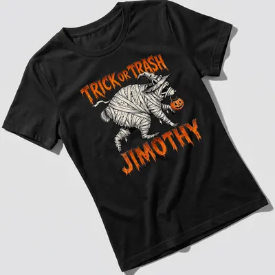 Halloween-themed shirt featuring a mummy raccoon with fun text — printed on a women's shirt