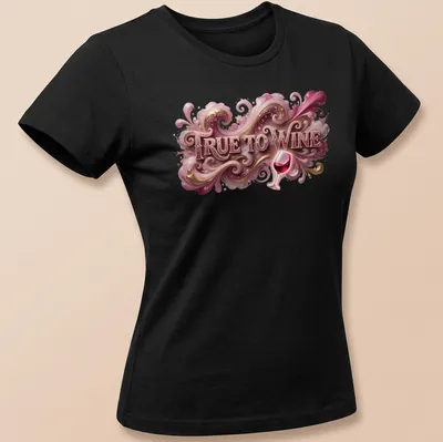 Illustration of an ornate wine glass with elegant swirls and the text 'TRUE TO WINE' — printed on a women's shirt