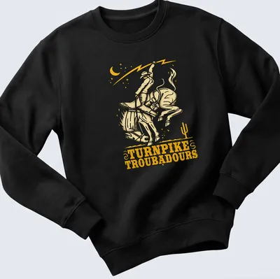 Vintage western t-shirt featuring a cowboy riding a horse with Turnpike Troubadours text — printed on a unisex sweatshirt