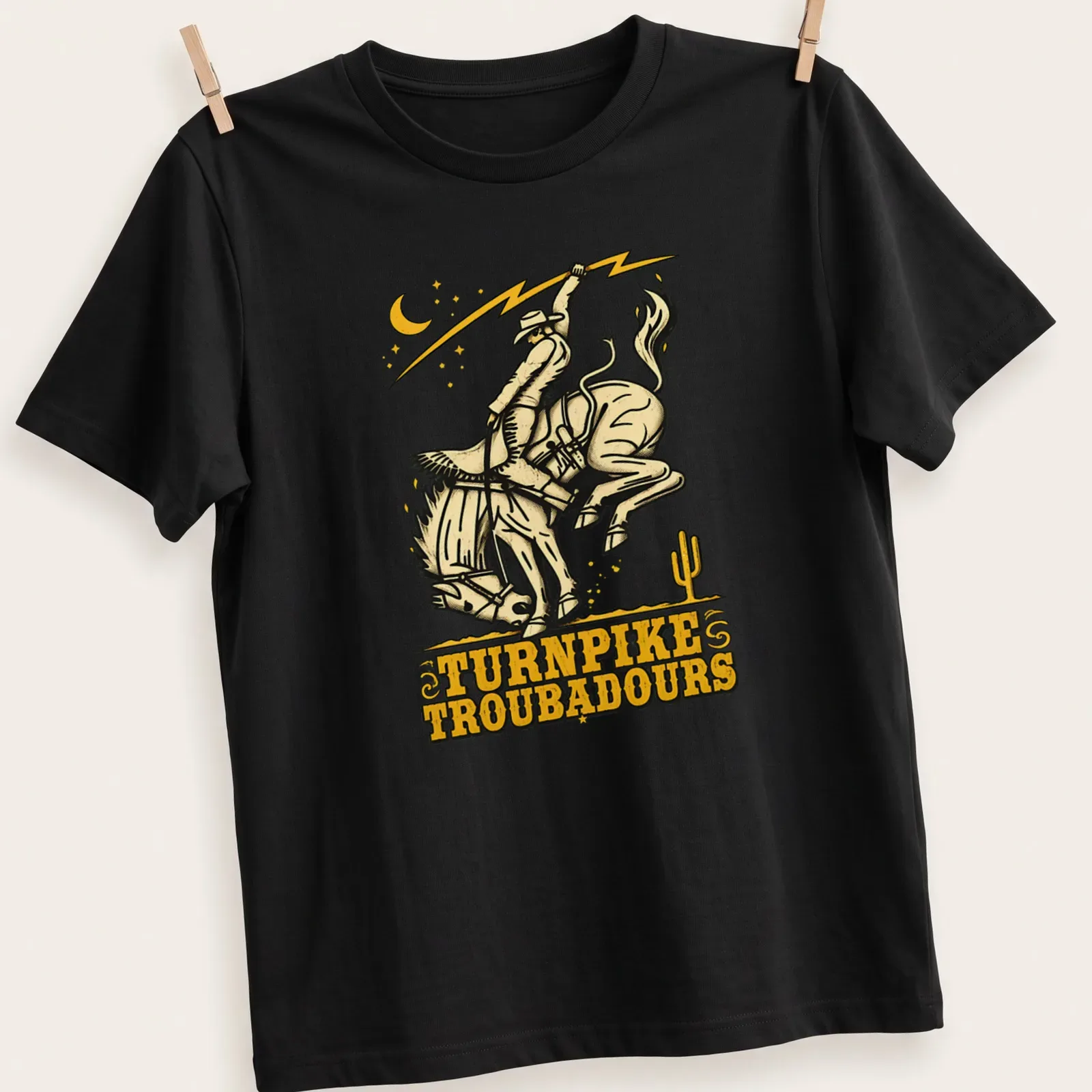 Vintage western t-shirt featuring a cowboy riding a horse with Turnpike Troubadours text — printed on a unisex t-shirt