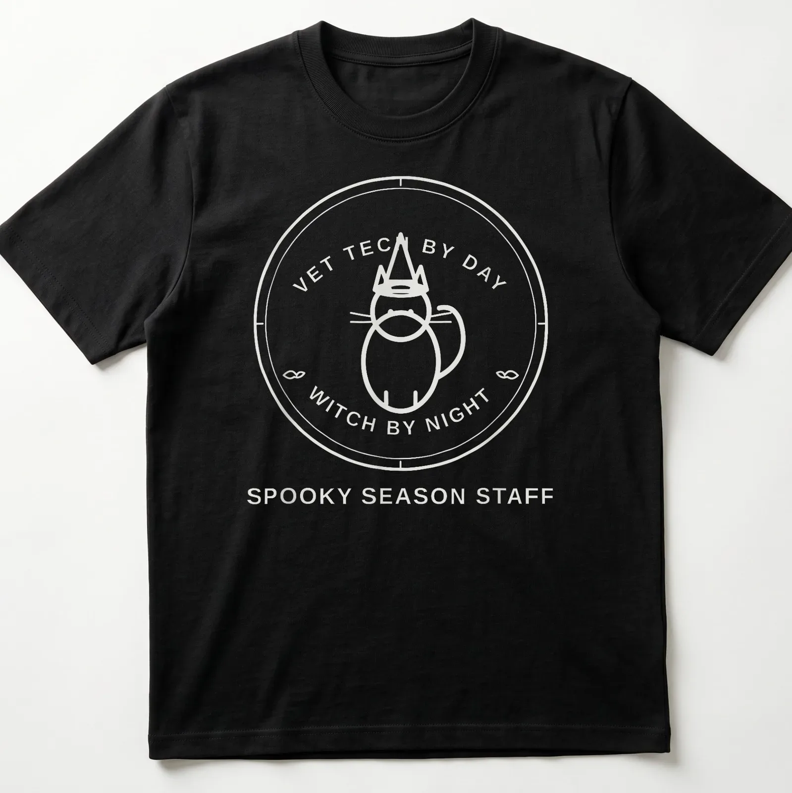 Circular badge design featuring the text Vet Tech By Day Witch By Night with a cat. — printed on a unisex t-shirt
