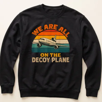 Retro airplane t-shirt with playful text about a decoy plane in vintage colors — printed on a unisex sweatshirt