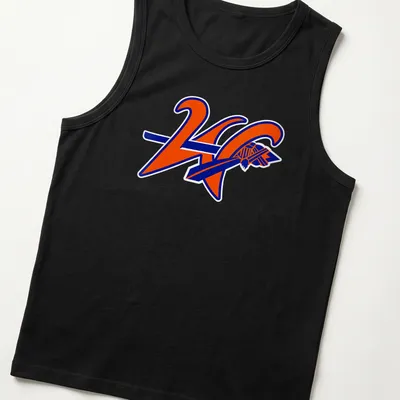 Bold graphic KC logo with text 'Westwood Warriors' in orange and blue — printed on a tank top