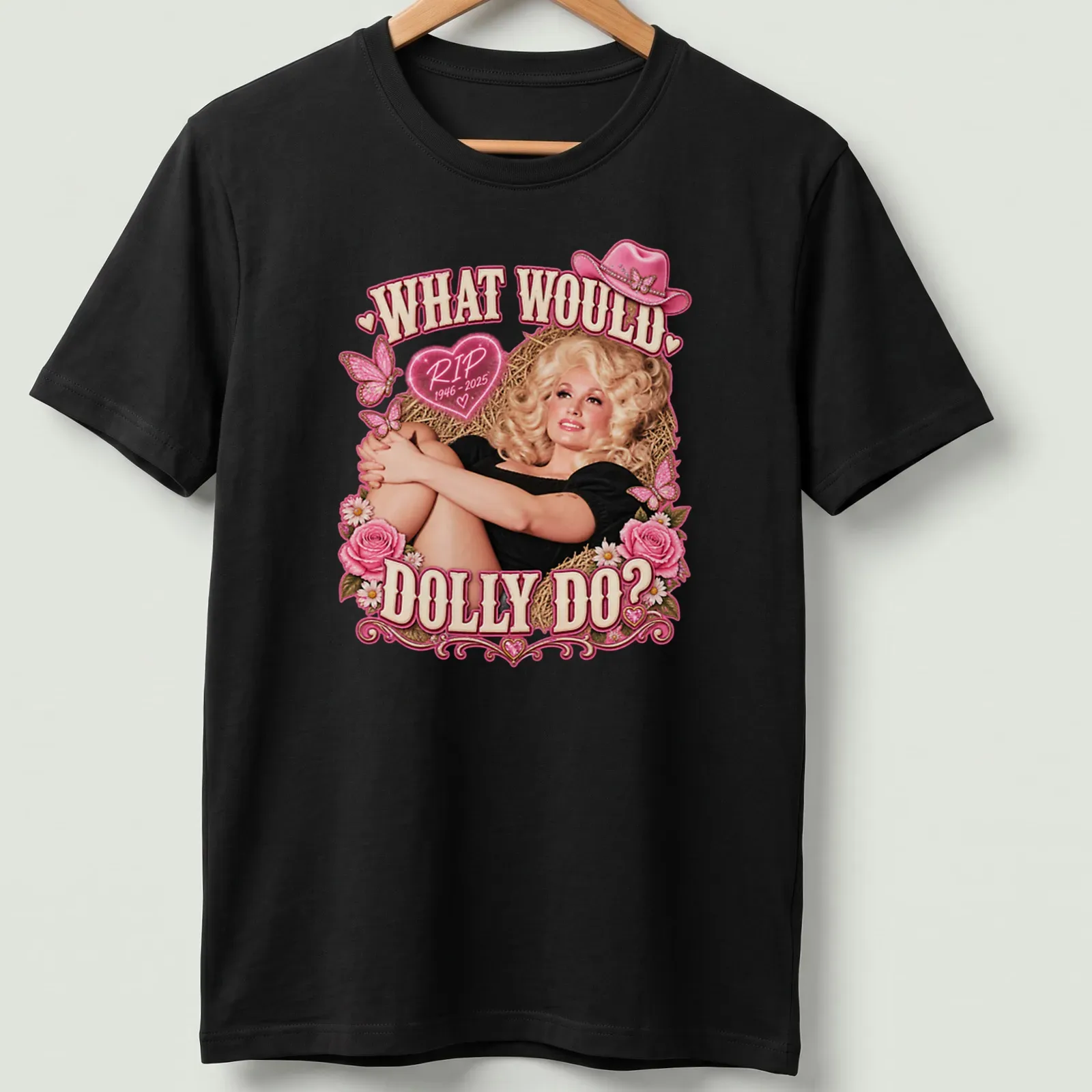 Vintage tribute t-shirt with Dolly Parton illustration and text in pink and black — printed on a unisex t-shirt
