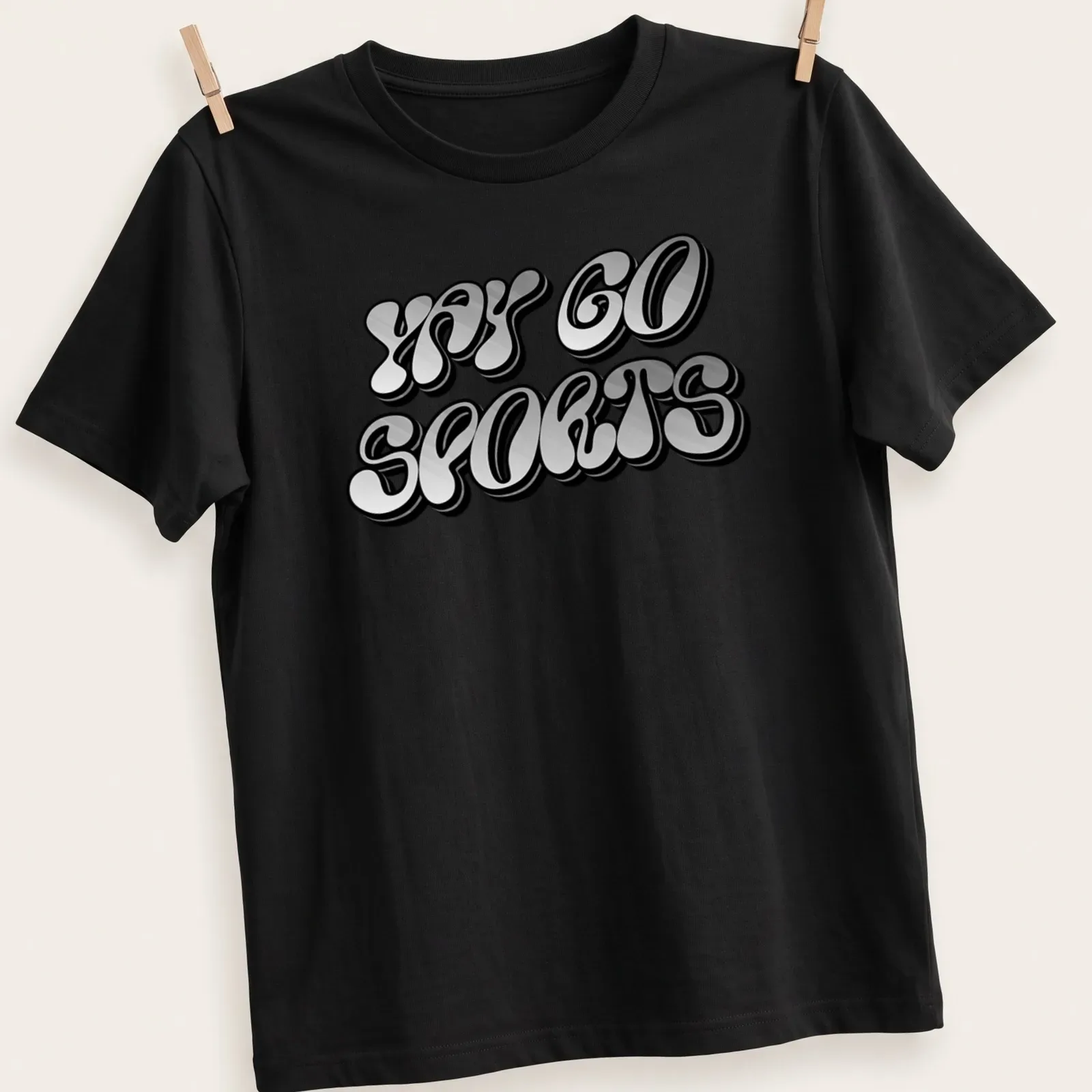 Bold playful design saying 'YAY GO SPORTS' on a black background — printed on a unisex t-shirt