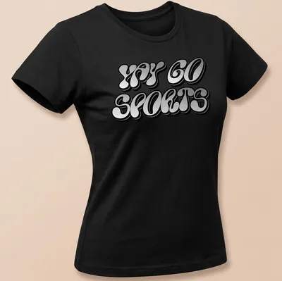 Bold playful design saying 'YAY GO SPORTS' on a black background — printed on a women's shirt