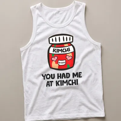 Kawaii-style shirt featuring a cute kimchi jar with joyful text — printed on a tank top