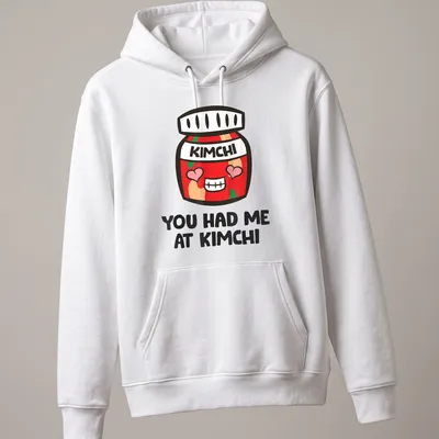 Kawaii-style shirt featuring a cute kimchi jar with joyful text — printed on a unisex hoodie