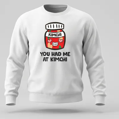 Kawaii-style shirt featuring a cute kimchi jar with joyful text — printed on a unisex sweatshirt