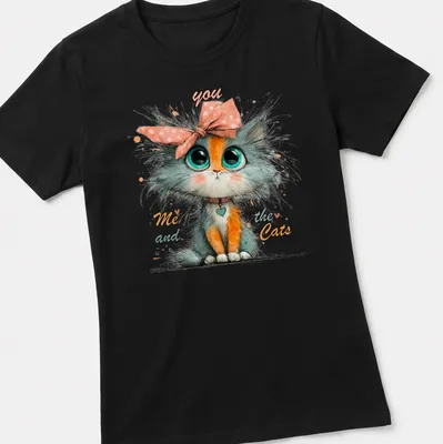 Whimsical illustration of a cute cat character with colorful text. — printed on a women's shirt
