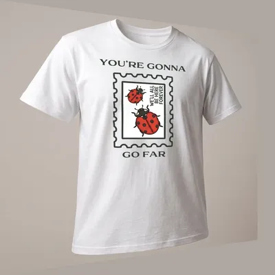 Illustrative T-shirt with ladybugs and encouraging text in red and green — printed on a unisex t-shirt (angled view)