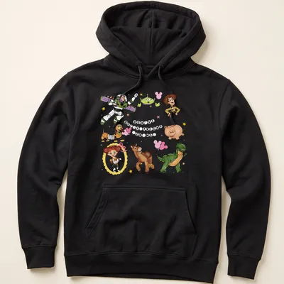 Toy Story characters with colorful cartoon style and printed text about friendship — printed on a unisex hoodie