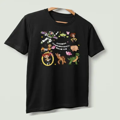 Toy Story characters with colorful cartoon style and printed text about friendship — printed on a unisex t-shirt (angled view)