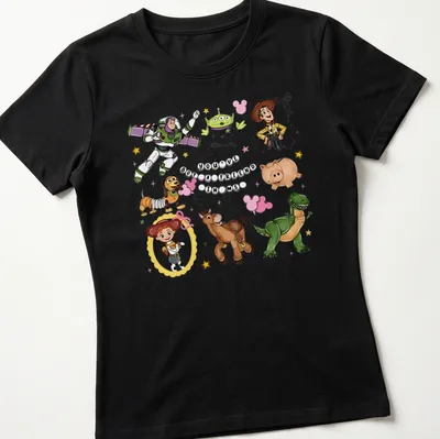 Toy Story characters with colorful cartoon style and printed text about friendship — printed on a women's shirt
