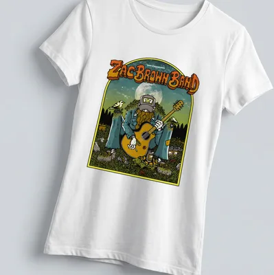 Vintage illustration of a guitar player under a moonlit sky with Zac Brown Band text — printed on a women's shirt